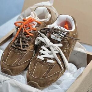 New Balance Brown and White Sneakers